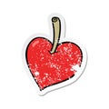 A creative retro distressed sticker of a cartoon love heart apple Royalty Free Stock Photo