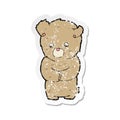 A creative retro distressed sticker of a cartoon shy teddy bear