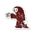 A creative retro distressed sticker of a cartoon spooky halloween costume Royalty Free Stock Photo