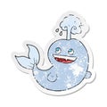 A creative retro distressed sticker of a cartoon whale spouting water