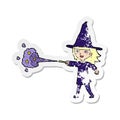A creative retro distressed sticker of a cartoon witch girl casting spell Royalty Free Stock Photo