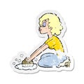 A creative retro distressed sticker of a cartoon woman scrubbing floor