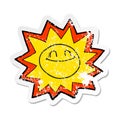 A creative retro distressed sticker of a happy cartoon sun Royalty Free Stock Photo