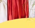 Creative retro layout made of yellow background for product placement or display with red velvet texture in the back with shade