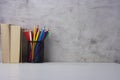 Creative`s workdesk with books and writing supplies with copy space Royalty Free Stock Photo