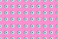 Creative seamless hypnotic pattern of googly eyes candy in vibrant bold holographic neon colors