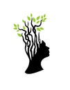 Creative silhouette of woman with tree representing hair Royalty Free Stock Photo