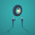 Creative solution business concept with two businessman and gear lightbulb.