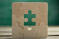 Creative solution for idea - business concept, jigsaw puzzle on the blackboard Royalty Free Stock Photo