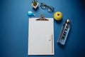 Creative Space for work: a sheet of paper, pencils, phone, glass