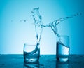 Creative splashing water in the glass Royalty Free Stock Photo