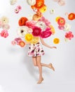 Creative spring composition. Dancing girl and flowers splash Royalty Free Stock Photo