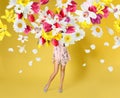 Creative spring composition. Posing girl and flowers splash