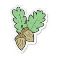A creative sticker of a cartoon acorns
