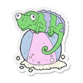 A creative sticker of a cartoon chameleon on ball