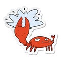 A creative sticker of a cartoon crab with big claw