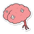 A creative sticker of a cartoon injured brain