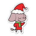 A creative sticker cartoon of a smiling elephant wearing scarf wearing santa hat