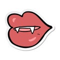 A creative sticker of a cartoon vampire fangs