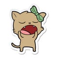 sticker of a cartoon yawning cat