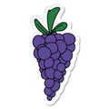 A creative sticker of a quirky hand drawn cartoon bunch of grapes