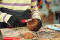 Creative student doing his project in workshop. Boy in the workshop makes crafts with coconut. School, development and learning Royalty Free Stock Photo