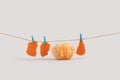 Creative summer concept with peeled tangerine isolated on a white background