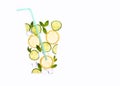 Creative summer drink composition. With lemon slices, mint leaves , cucumber and ice cubes. Minimal flat lay lemonade drink Royalty Free Stock Photo
