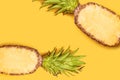 Creative summer fruit concept. Pattern with bright pineapples on yellow background. Top View Royalty Free Stock Photo