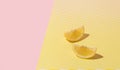 Creative summer layout made of lemon on yellow and bright pastel pink background. Citrus fruit minimal concept Royalty Free Stock Photo