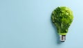 Eco-Friendly Energy: Light Bulb Made of Green Leaves Royalty Free Stock Photo