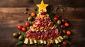 Creative table setting for the holiday, a Christmas tree made of food. Cheese sausage and various vegetables. Wooden
