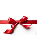 Red ribbon bow on card note white background wrapping. Copy text space. Royalty Free Stock Photo