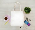 Creative, trendy, artistic eco, tote, cotton bag mock up. Mockup with earphones, a pencil,cup,paints,crayons, tassels.