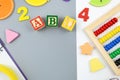 Creative trendy colors ABC, numbers, shapes, fractions on gray background. Interesting funny preschool games