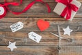 Creative Valentine's Day background with gift tags and box, top view. Royalty Free Stock Photo