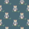 Kids seamless pattern with grey owls on the branches.