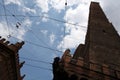 Creative view of the two towers and Chiesa di San Bartolomeo, Bo Royalty Free Stock Photo