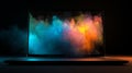 A creative visual metaphor for a burst of energy or ideas, depicted as colorful powder exploding from within a laptop screen Royalty Free Stock Photo