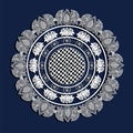 Creative white doily lace pattern on blue background..