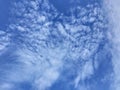 White Micro stratus clouds visible in the top of the sky Royalty Free Stock Photo