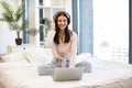 Creative woman working remotely from home listening favorite music. Royalty Free Stock Photo