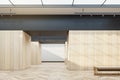 Creative wooden exhibition hall interior with sunlight from ceiling window, mock up place and seats. Gallery and museum concept.