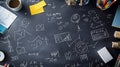 Creative Workspace with Chalkboard and Various Stationery Items Royalty Free Stock Photo