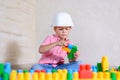 Creative young boy playing with building blocks Royalty Free Stock Photo