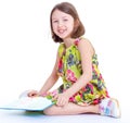 Creative young girl looking photo album. Royalty Free Stock Photo