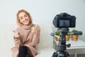 Creative young woman recording video blog for social media network. Royalty Free Stock Photo