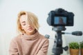 Creative young woman recording video blog for social media network. Royalty Free Stock Photo