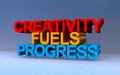 creativity fuels progress on blue Royalty Free Stock Photo