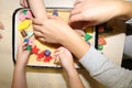 Children playing with kinetic sand, croup and designer in preschool. The development of fine motor concept. Creativity Game Royalty Free Stock Photo